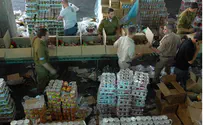 Border Police Officers Pack Passover Food for the Needy