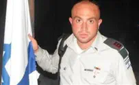 Injured Officer Salutes with Mangled Arm