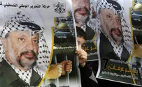 AFP photo Arafat Exhumation Painful but Necessary, Says Widow