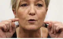 Le Pen Calls for Dissolving National Assembly as Hollande Tanks