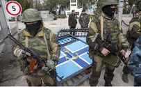 Reuters Russian Forces Storm Ukrainian Air Base in Crimea, Killing 1