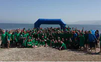 Leora Ben David Hundreds Swim the Kinneret to Help Special Needs Young Adults