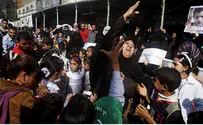 Terrorists' Families Celebrate, Pass out Candies in Jerusalem