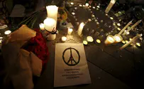 Family of terrorists light solidarity candles