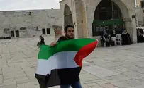 Watch: Arab waves PLO flag in front of cops on Temple Mount