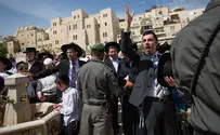 Officer investigated for pointing gun at haredi protesters