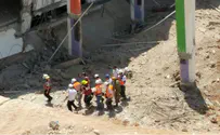 Watch: Wounded found amid rubble of collapsed parking garage