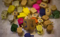 Boy Scouts set world record in dreidel spinning
