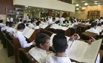 Yeshiva students defend holy books with their bodies