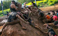 Thousands of Israelis get filthy for 'Mud Day'