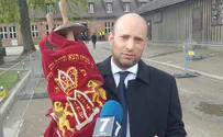 Bennett with Torah scroll saved from Holocaust