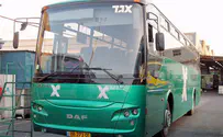 Woman caught in bus trunk with legs hanging outside