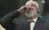 Watch: War criminal commits suicide in international court