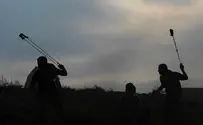 2 hurt in stone-throwing attack