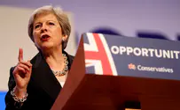 May blasts Corbyn over anti-Semitism