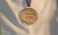 Report: Olympian not considering selling his gold medal