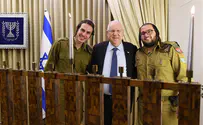 President lights Hanukkah candle with haredi soldiers