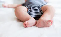 Baby hospitalized in serious condition; father arrested