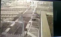 Watch: Boy runs into tracks, throws stones at train