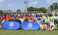 Jewish and Arab girls practice soccer together
