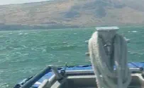 Watch: Police rescue two men stranded in Kinneret
