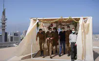 צפו: סוכה על גג "הקריה"