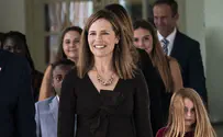 Barrett responds to 'White Colonist' jab for adopting Haitians