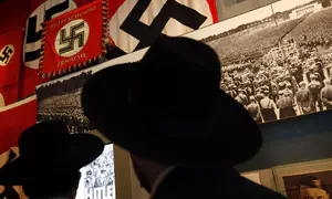 Kickboxer with SS tattoo makes Nazi salute after beating Jew