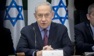 Netanyahu bangs on table to quiet ministers during heated meeting