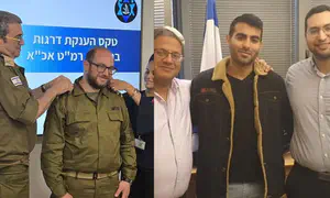 היו"ר שפרש והרב שהועלה בדרגה