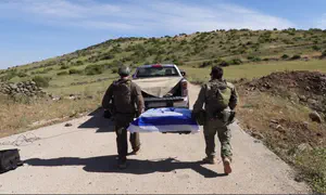 קדיש ליד ארונו של צבי פלדמן ז"ל