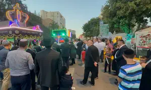 Torah dedication march pauses to show solidarity for hostages