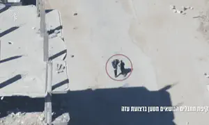 Terrorists walk down street with bomb, are taken out from the sky