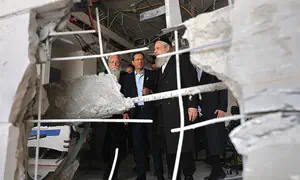 Herzog visits missile strike sites: 'This place will be rebuilt'