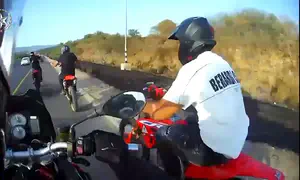 Motorcyclist flees police and crashes into guardrail