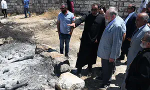 Amb. Huckabee visits PA village near torched church