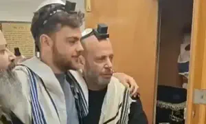 Severely wounded officer prays after hospital release