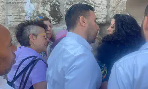 Women of the Wall smuggle Torah scroll in baby carrier