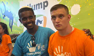 Wounded soldier volunteers with special-needs children