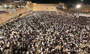 Watch: Tens of thousands attend Selichot prayers at Western Wall