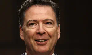 Former FBI Director Comey charged with threatening Trump