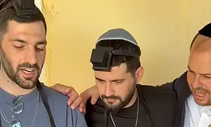 Twins who survived Hamas captivity put on tefillin