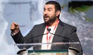 British commentator held in US lands back in London