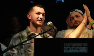 Captivity survivor calls on public to put on tefillin with him