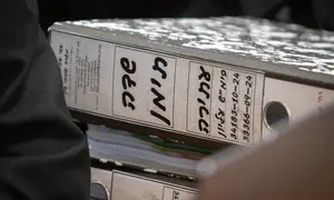 Prosecutor in abuse case suspended over sensitive info leak