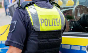 Blood and swastikas on cars and buildings