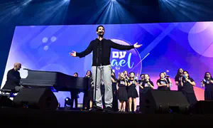 Sagui Dekel‑Chen and Idan Raichel together on stage in Florida