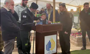 Fallen soldier's son sings 'Ani Ma'amin' at father's funeral