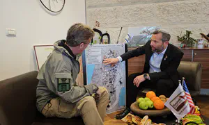 US Rep shown bullets fired at council head's home