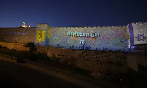 Walls of Jerusalem's Old City light up in honor of Yom Ha'atzmaut